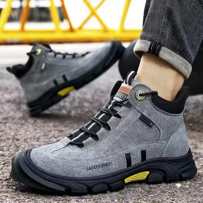 kopen Grijze suede veiligheidsschoenen met Kevlar middenzool en gladwerende rubberzool online manufacture